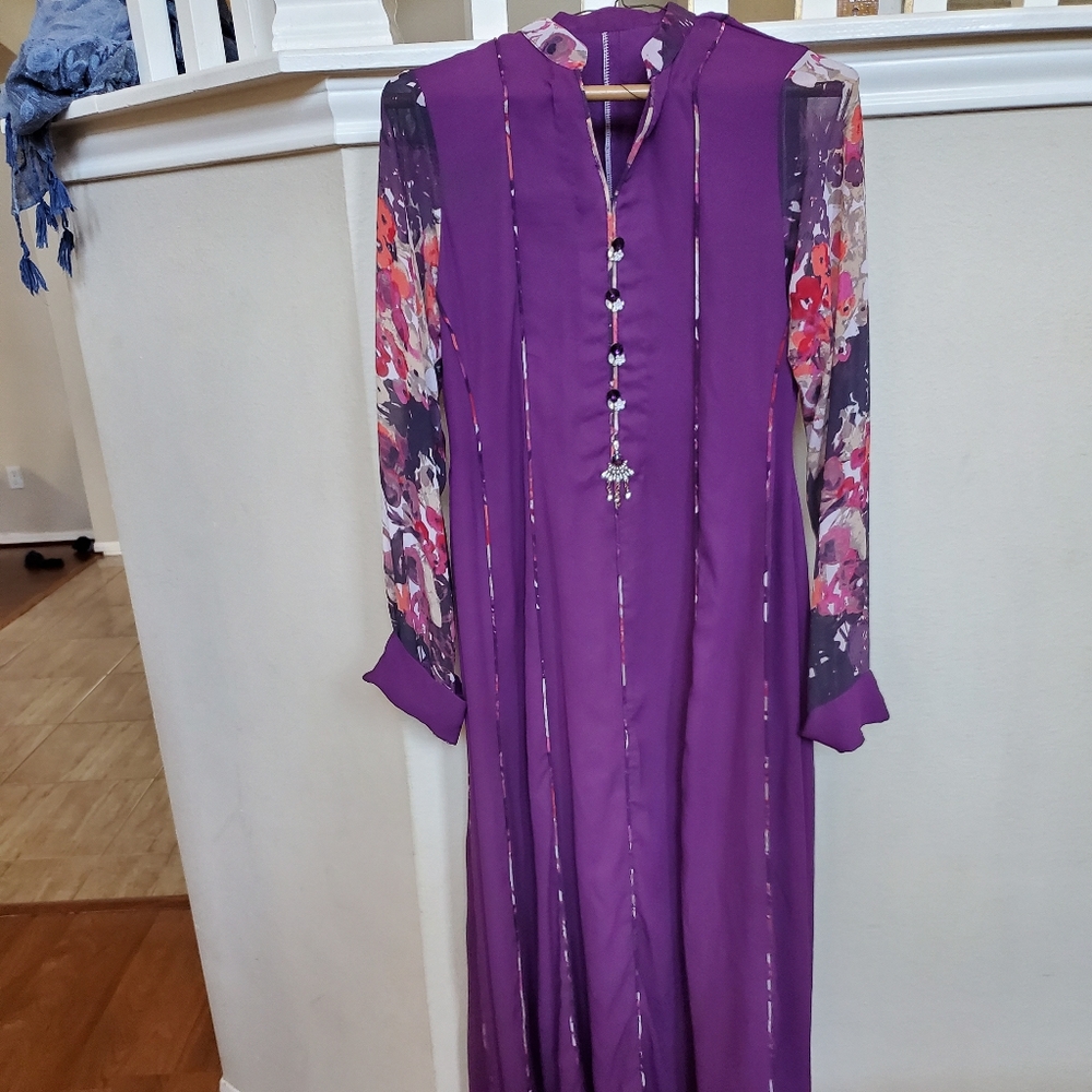 Eastern panelled dress with a trouser and drape
